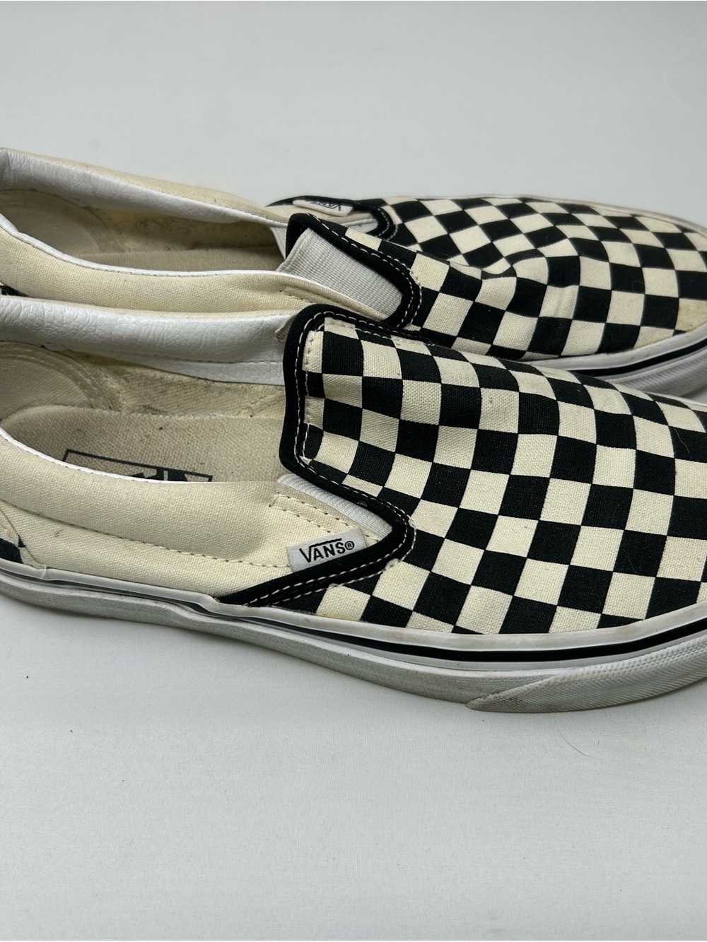 Vans Slip-On Checkerboard Canvas Sneakers in Black and White